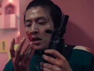 Dae-ho con la sangre de un jugador.png (459 KB) Dae-ho with a player's blood on his face