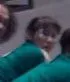 Mi-hwa looking at Gi-hun.