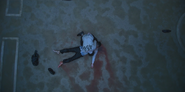 Gi-hun crying with grief when Sang-woo killed himself