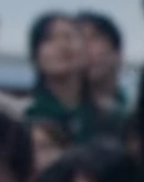 Player 334 watching as Seon-nyeo fails Spinning Top.