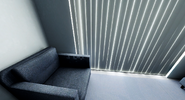 A weird pixel-like graphic light bug on the armchair.
