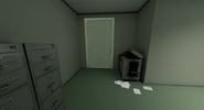The other end of the white hallway.