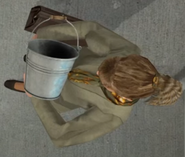 Mariella holding her Bucket.