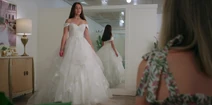 Belly tries on a debutante dress.