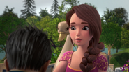 Alise is very surprised by the way the Li kisses her hand.