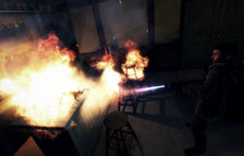 A flame-thrower, as seen in The Thing: Station Survival (2011).