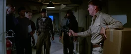 Garry assures the men of his innocence - The Thing (1982)