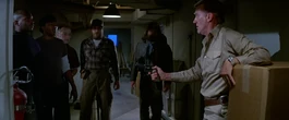 Garry assures the men of his innocence, The Thing (1982)