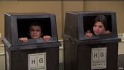 Max and Phoebe in Trash Bins