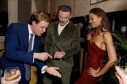 Archie with Luke Evans and Emma Weymouth