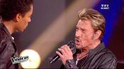 Stéphan lors de son duo avec Johnny Hallyday