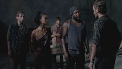 Rick hablando con Tyreese