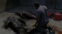 Tyreese encontrando los cuerpos de Karen y David.