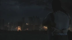 Shane consolando a Lori mientras veían como Atlanta era destruida.