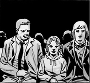 Nicholas junto a su familia en el funeral de Abraham