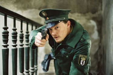 Norman Reedus como Polizist Schmitz en Antibodies