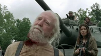 Hershel siendo decapitado por el Gobernador.