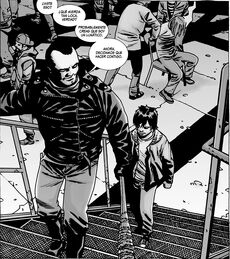 Negan y Carl dentro de la guarida de los Salvadores.