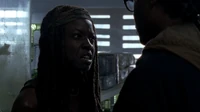 Michonne confrontando las acusaciones de Heath.