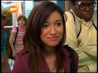 Christian Serratos como Suzie Crabgrass en El Manual de Supervivencia Escolar de Ned.