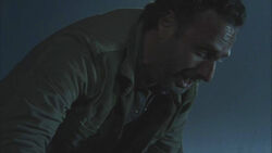Rick llorando tras haber asesinado a Shane.