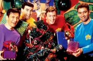 The Wiggles holding presents