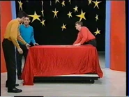 Anthony and Murray putting cloth on the box