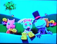 Puppets Pig, Mouse and Frog eating fried mosquito with bread and butter