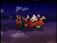 Santa and his elf and reindeer crew