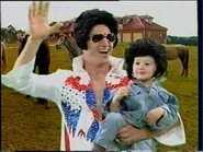 Tony and Theodore in Elvis costumes and wigs