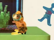 Linny next to a fishtank
