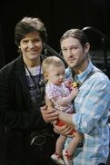 Lucy with her father and grandfather