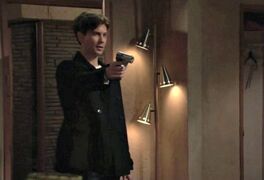 Zack aims a gun