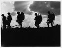 1280px-Battle of Broodseinde - silhouetted troops marching.jpg