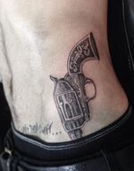 A Gun on hip c. November 21, 2013