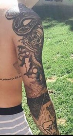 Updated right arm sleeve tattoo (c. 2017)