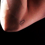 Puzzle piece on right arm near elbow c. May 28, 2012