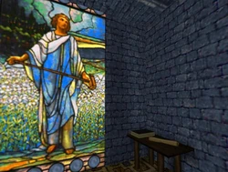 The scroll on the table contains the Prayer of the Wallbuilder.