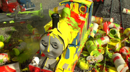 Thomas covered in red, yellow and green paint