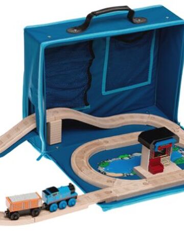 wooden train set in carry case