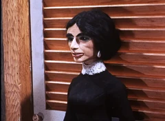 Mrs Files holds the door shut