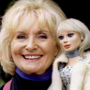 The "blinker" head still exists today, though it has lost its eyelids. Sylvia Anderson is shown with it.