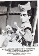 No. 35 Scott at the controls of Thunderbird 1 control levers operate vertical and horizontal flight positions