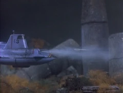 Firing a torpedo at Thunderbird 4