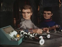 Dempsey (right) sitting next to Kenyon (left)