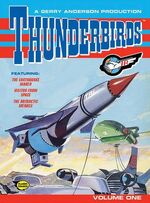 The cover of the smaller volume 1, which has artwork of Thunderbirds 1 and 2 with grapple lines attached to a ship