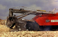 Rock crusher in lowered position