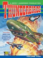 The cover of the smaller volume 2, which was artwork of Thunderbirds 1 and 2 flying away from an explosion