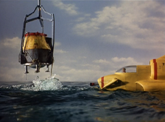 Thunderbird 2 lifts the bell from the sea