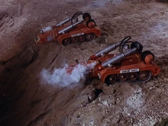 The two Recovery Vehicles firing their magnetic grapples.